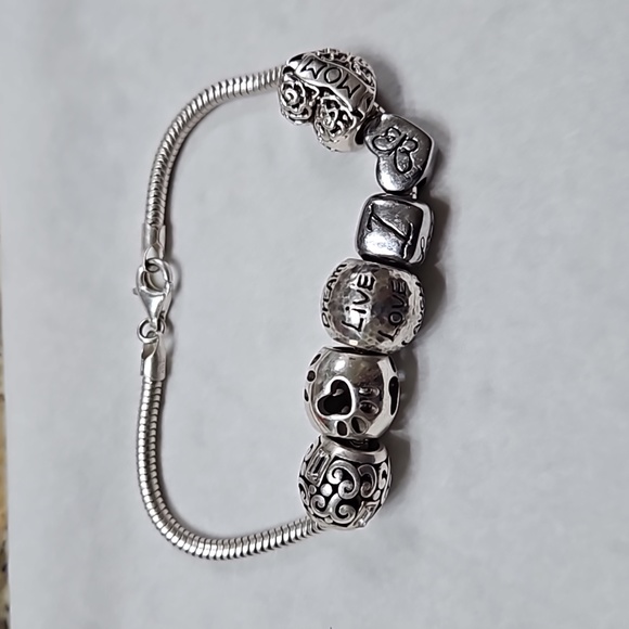 Pandora Jewelry - Sterling silver bracelet with charms